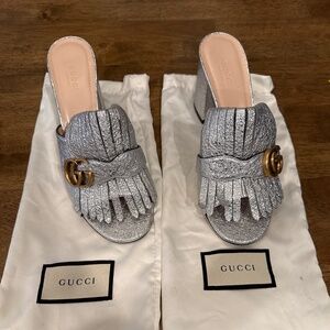 Gucci Silver Metallic GG Fringe Mule Heels | Size 39